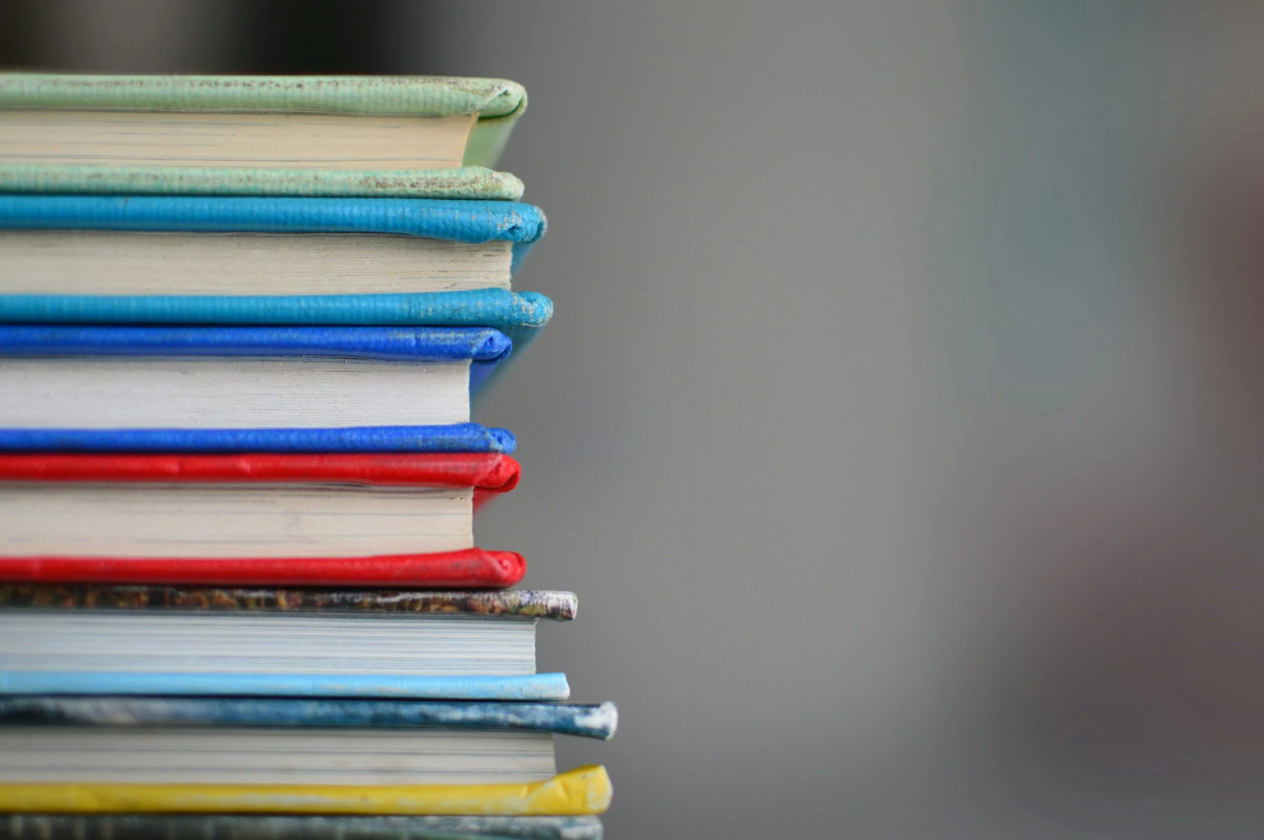 shallow focus photography of shallow focus photography of books